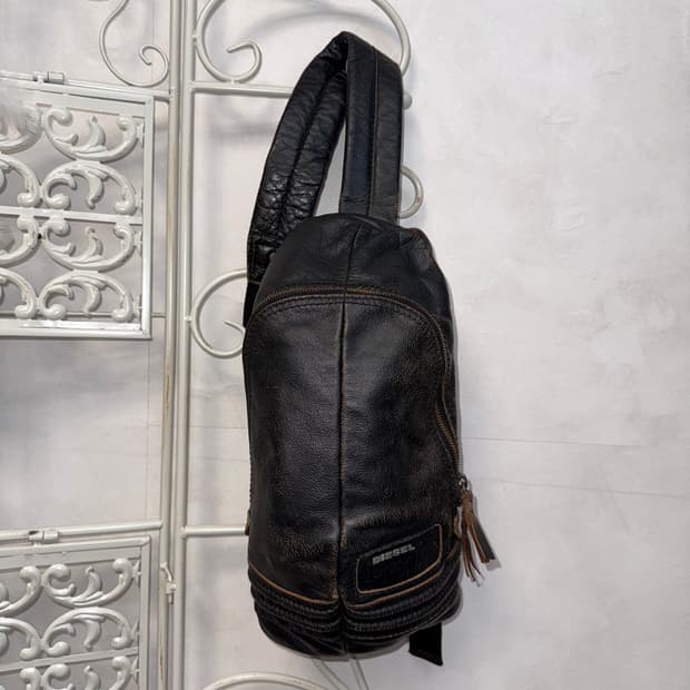 DIESEL aging brown cowhide body bag