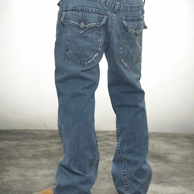 트루릴리전 플레어 조이 부츠컷 데미지워싱 연청 데님팬츠