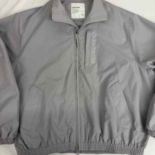 [M] 코드그라피 오버핏 바람막이 자켓