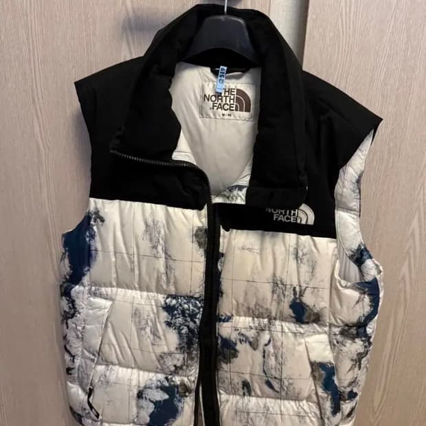 노스페이스 화이트라벨 눕시 지구 패딩조끼