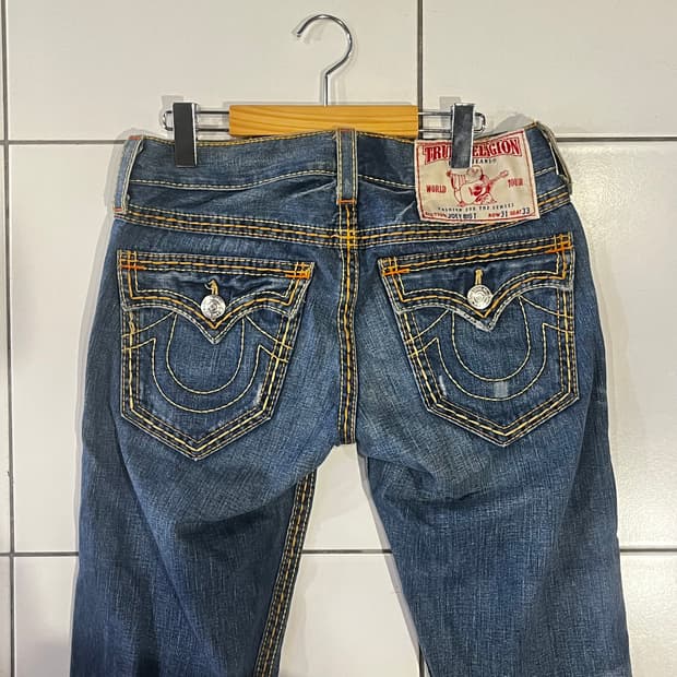 트루릴리젼 조이 빅 티 부츠컷 데님팬츠