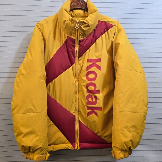 코닥 빠니보틀  옐로우 패딩 점퍼