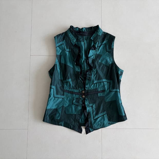 geometric ruffle vest