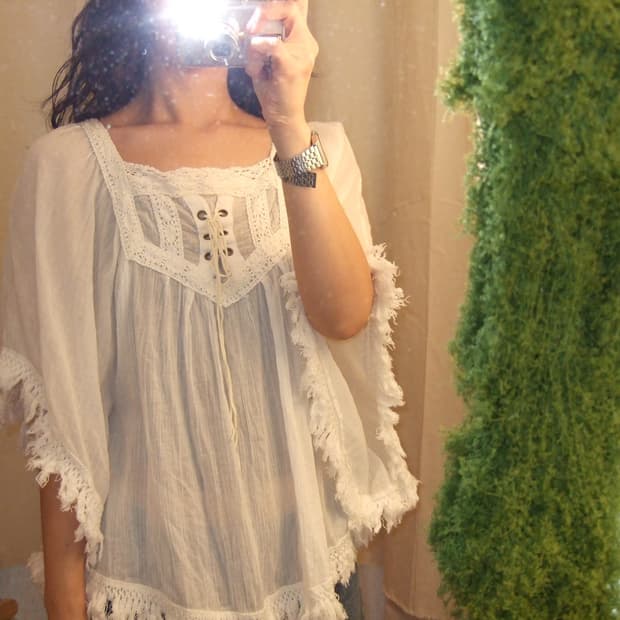 white poncho bl