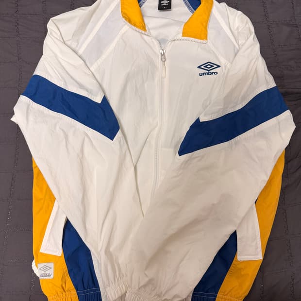 팝러쉬 컬러블럭 스탠넥 바람막이 자켓 / sweetcorn UQ123CJ