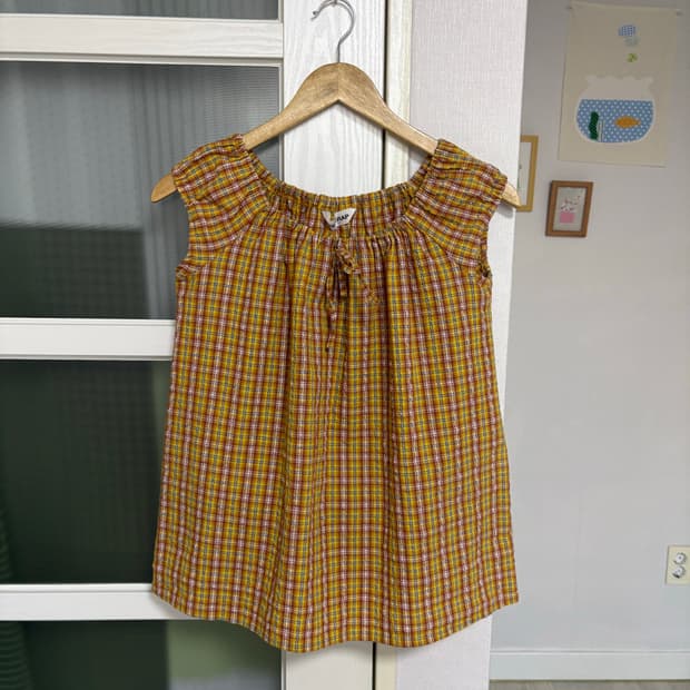 오렌지 체크 퍼프 소매 블라우스