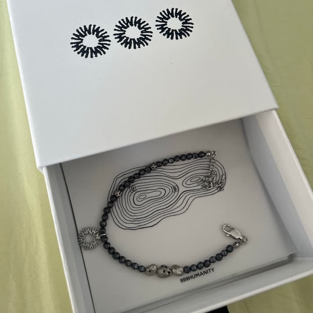 999휴머니티 팔찌