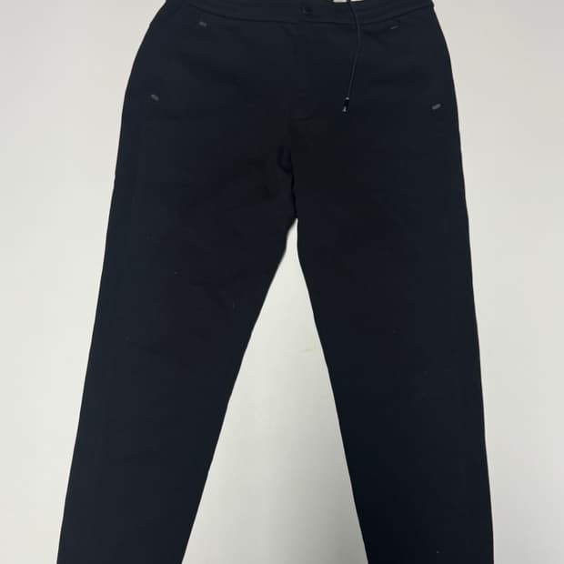 디스커버리 트레이닝 팬츠 블랙 31.4인치