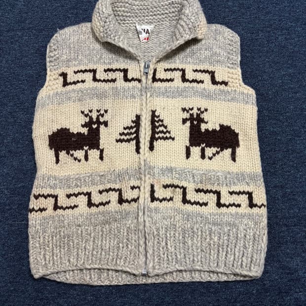 TUAK 코위찬 니트 베스트