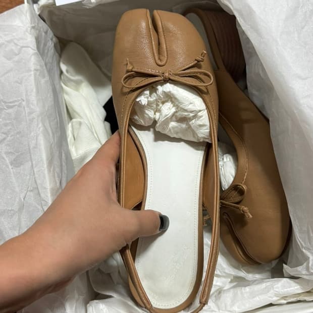 38)마르지엘라 타비 슬링백