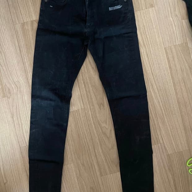 off-white slim fit denim jeans
