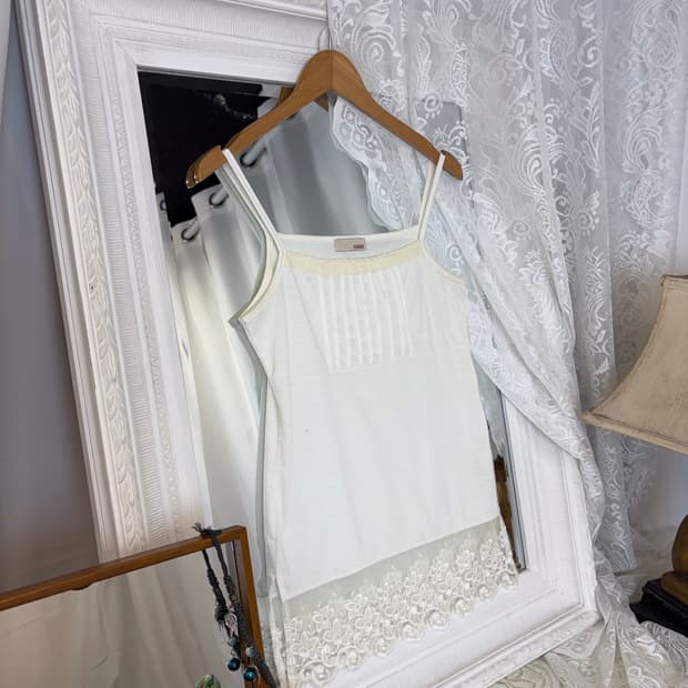 white frill sleeveless
