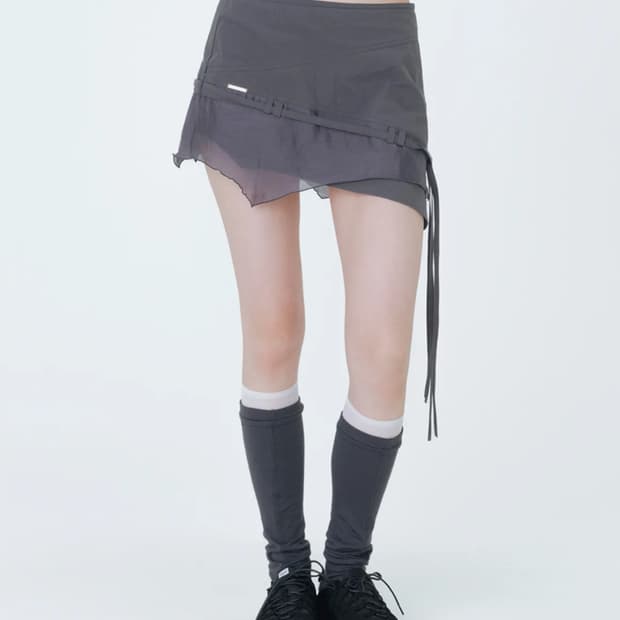 미세키서울 Diagonal sheer string mini skirt