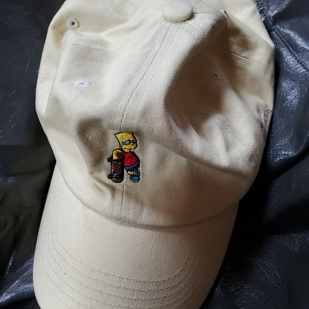 심슨스. 모자 여성 