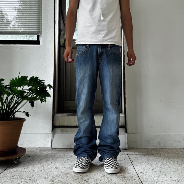 Levi’s 527 미디엄 워시 부츠컷 데님 팬츠