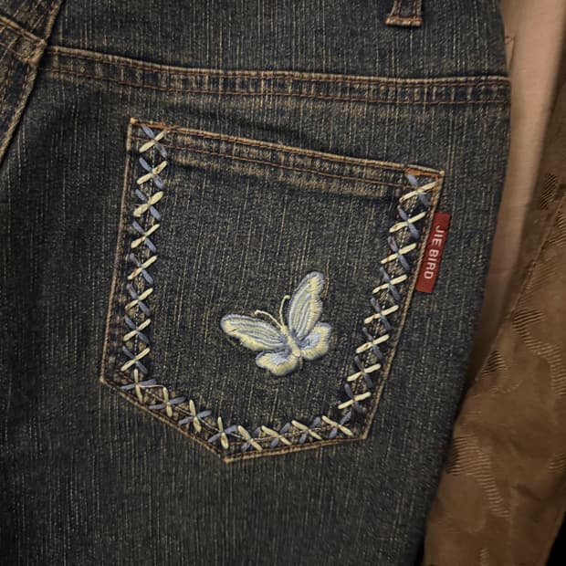 JIE BIRD 나비 부츠컷 청바지