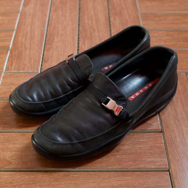 Prada sports buckle strap loafers