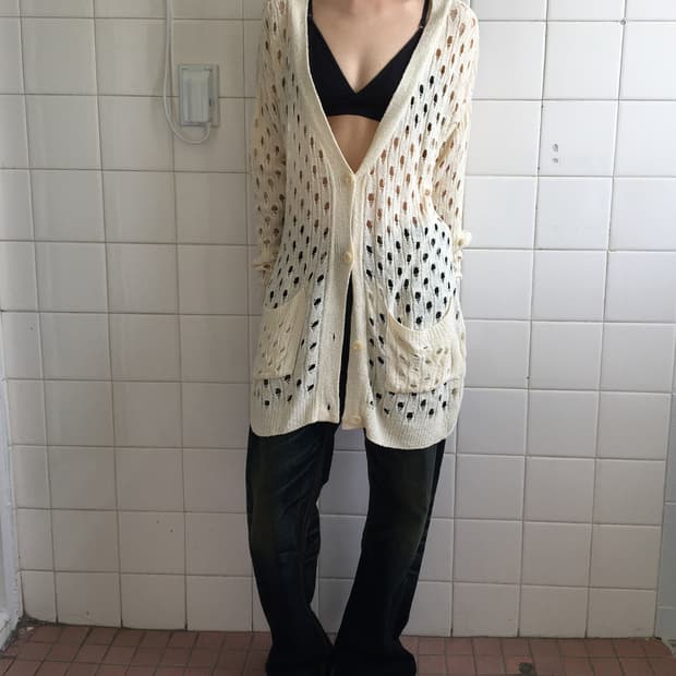 Punching pattern knit cardigan