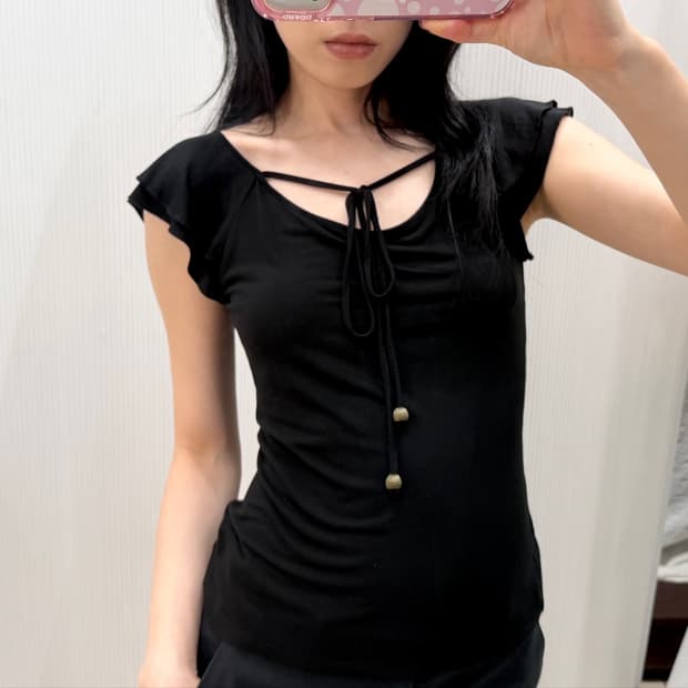 Black string ruffle top