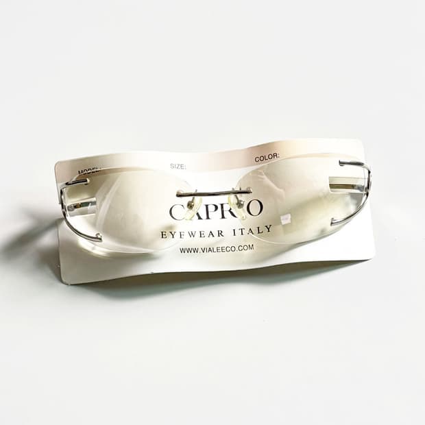 CAPRIO 무테 스퀘어 프레임 빈티지 틴트 선글라스