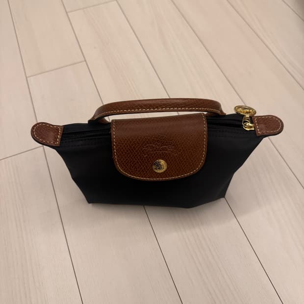 롱샴 르 플리아쥬 미니 핸들 파우치 블랙