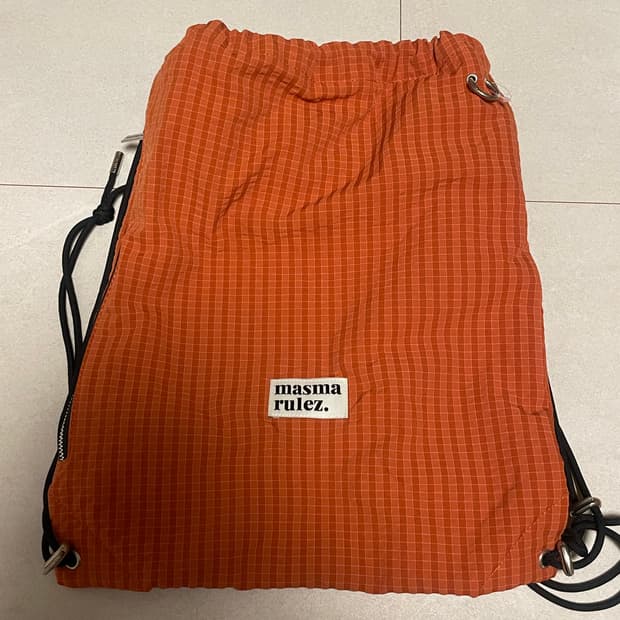 마스마룰즈 오렌지 체크 스트링 백팩