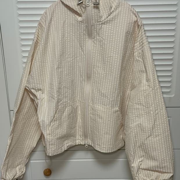 남녀공용 아이보리 바람막이