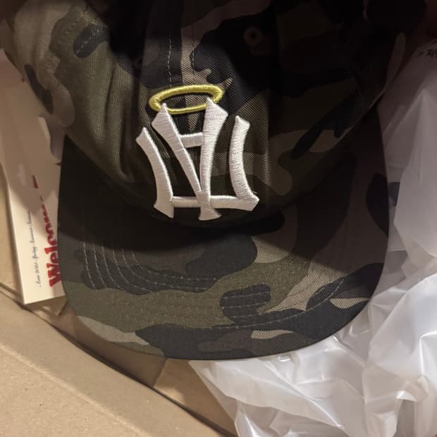 aeae AE SYMBOL ANGEL WING CAP [CAMO]