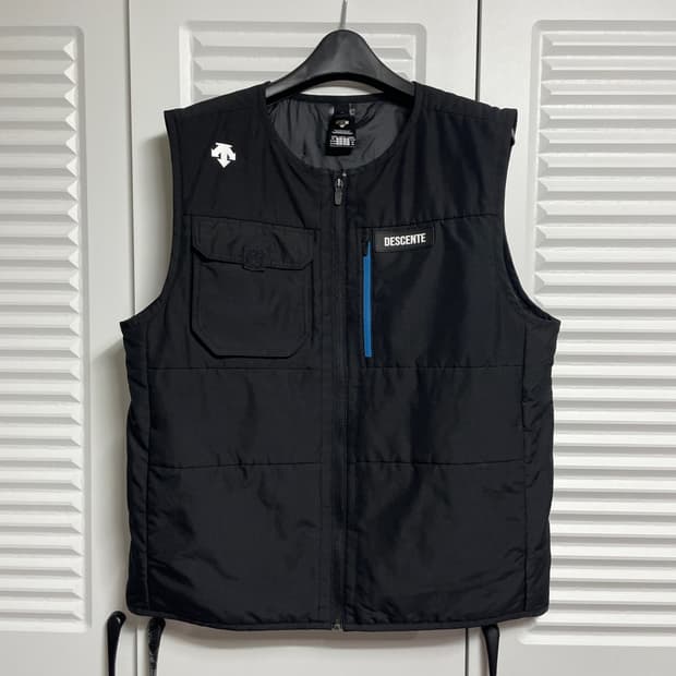 데상트 집업 조끼