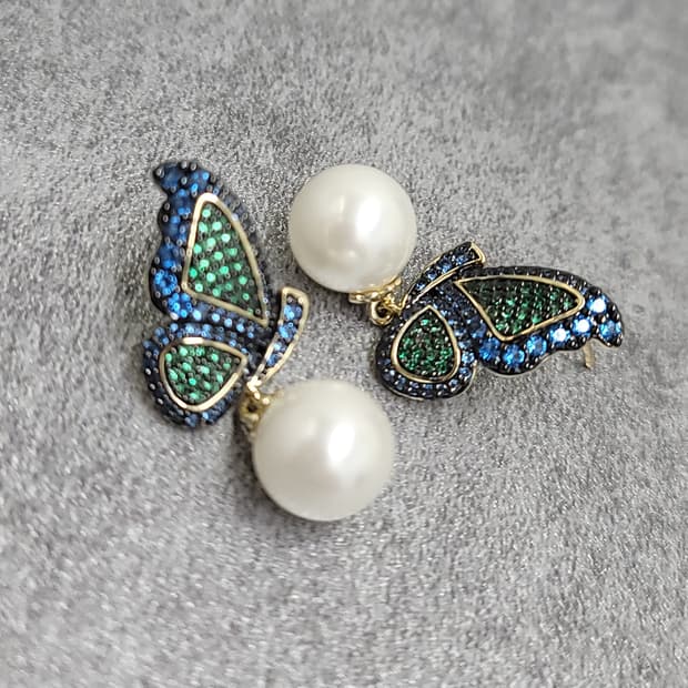 butterfly pearl earrings