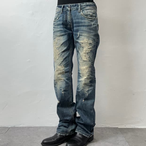 Distressed Heavy-Wash Zippered Jeans