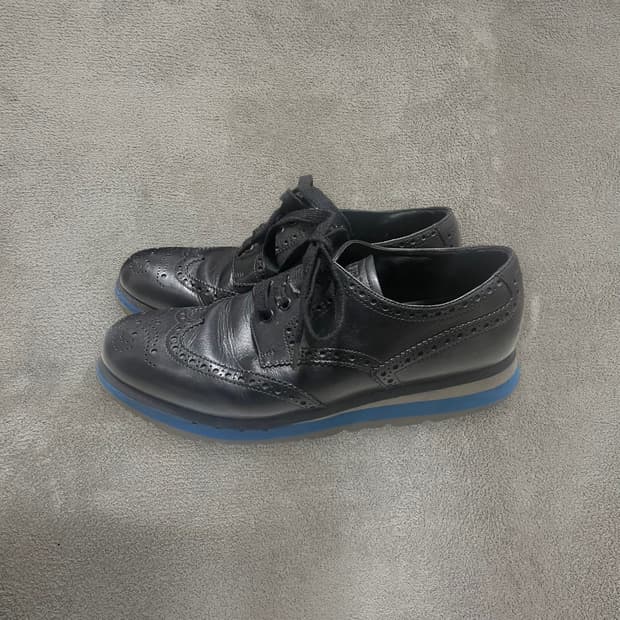 285) 프라다 스포츠 빈티지 레더 윙팁 스니커즈 신발