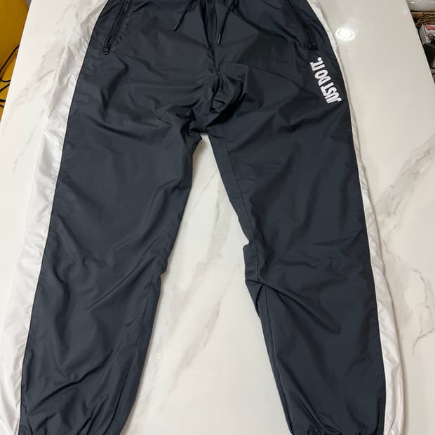 [M] 나이키 NSW 저스트 두 잇 시즌 우븐 팬츠