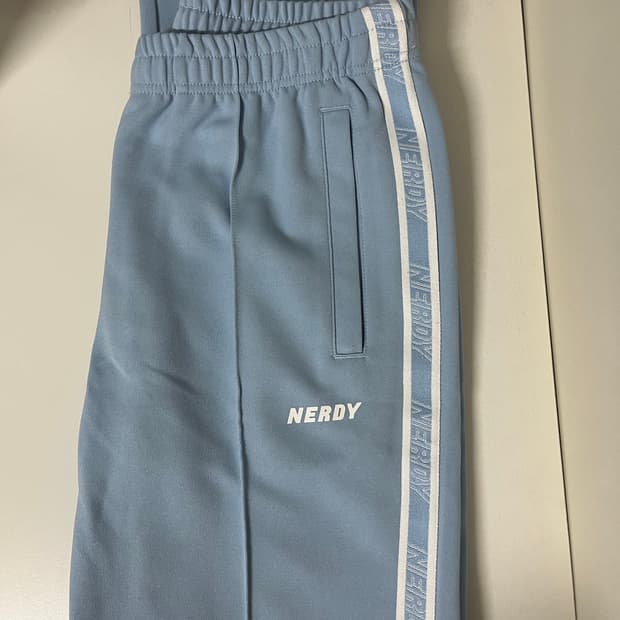 널디 로고 테잎 트랙 팬츠 스카이블루 M