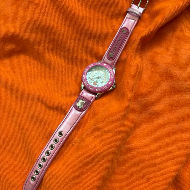 vintage hello kitty metal watch