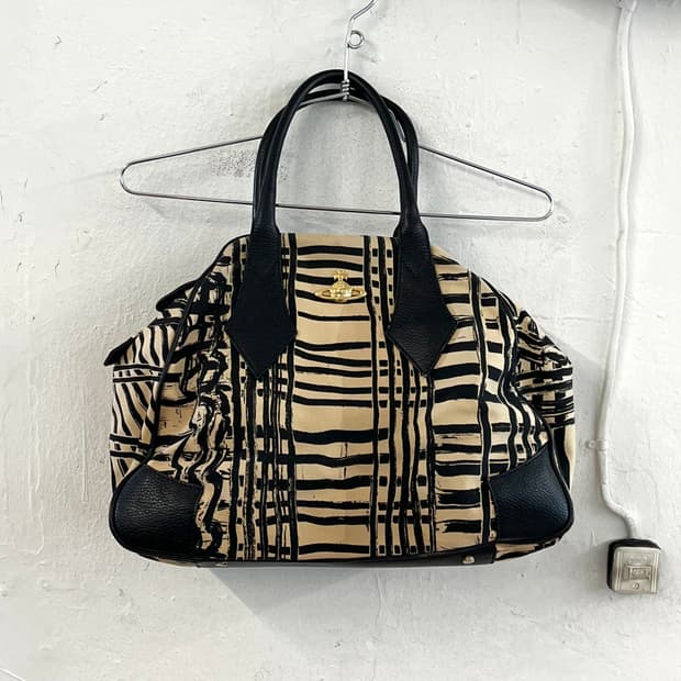 비비안웨스트우드 오알비 애니멀 프린팅 캔버스 레더백