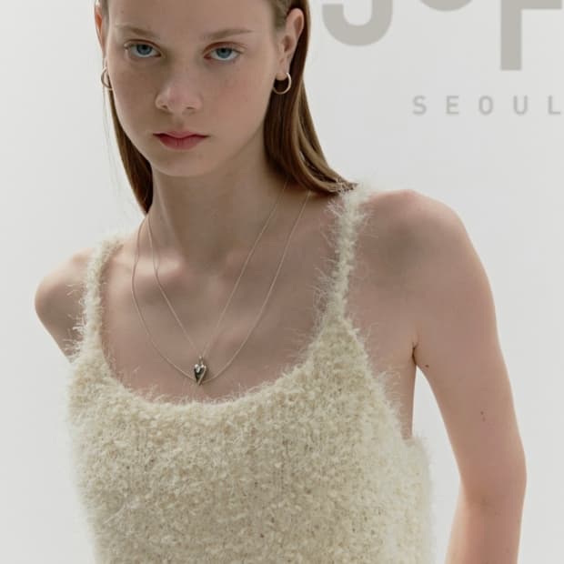 NEW BACK STRING SLEEVELESS KNIT TOP