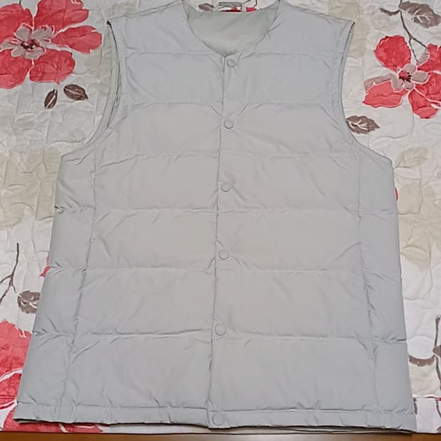 스파오 오리털경량조끼 95 가슴51 기장69