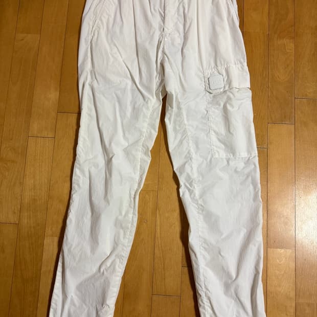 CP컴퍼니 플랫나일론 트랙 팬츠