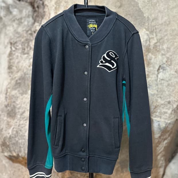 스투시 월드 트라이브 바시티 자켓