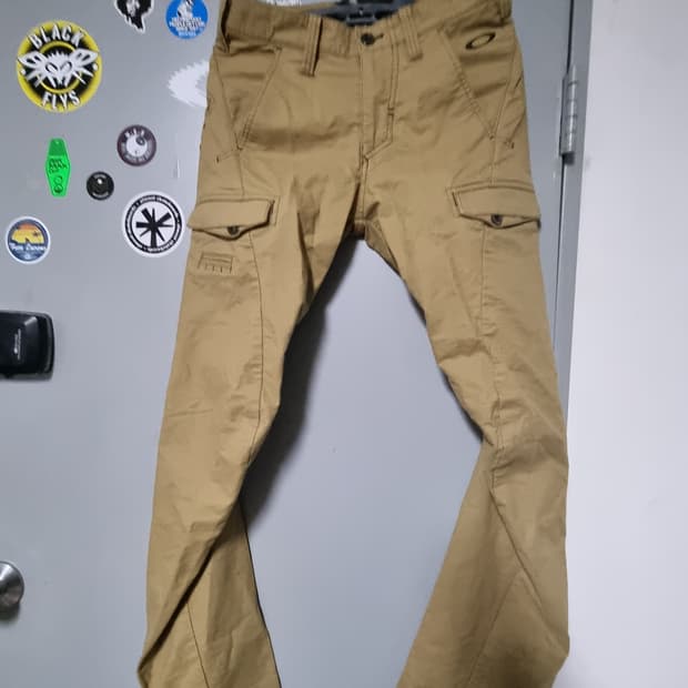 오클리 트위스트 슬림 부츠컷 카고 바지