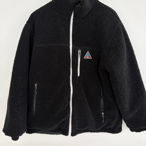 네파 블랙앤 화이트 리버시블 패딩