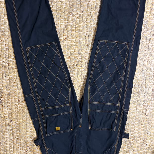 캐피탈 럼버팬츠