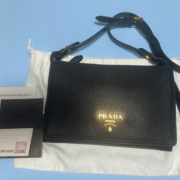 프라다 비텔로 블랙 미니 크로스백(1BH031)