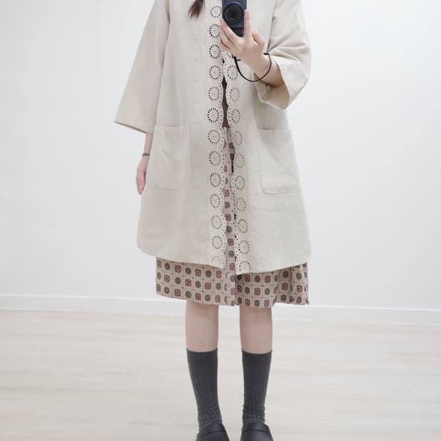 Light beige punching one-piece