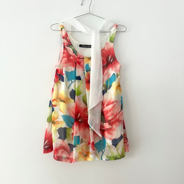 Shoulder drape floral sleeveless blouse