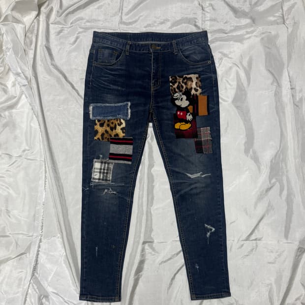 Patchwork character denim jeans
