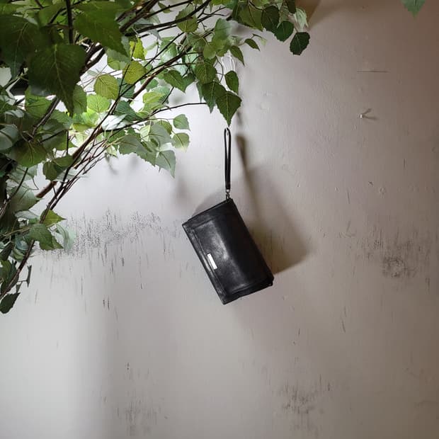 nom 레더 클러치백