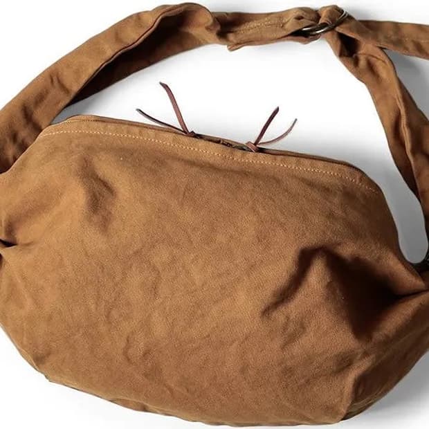 캐피탈 스너프킨백 카멜 1회착