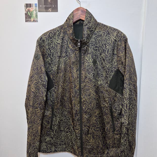 코오롱  멋진 패턴 바람막이 100
사이즈  